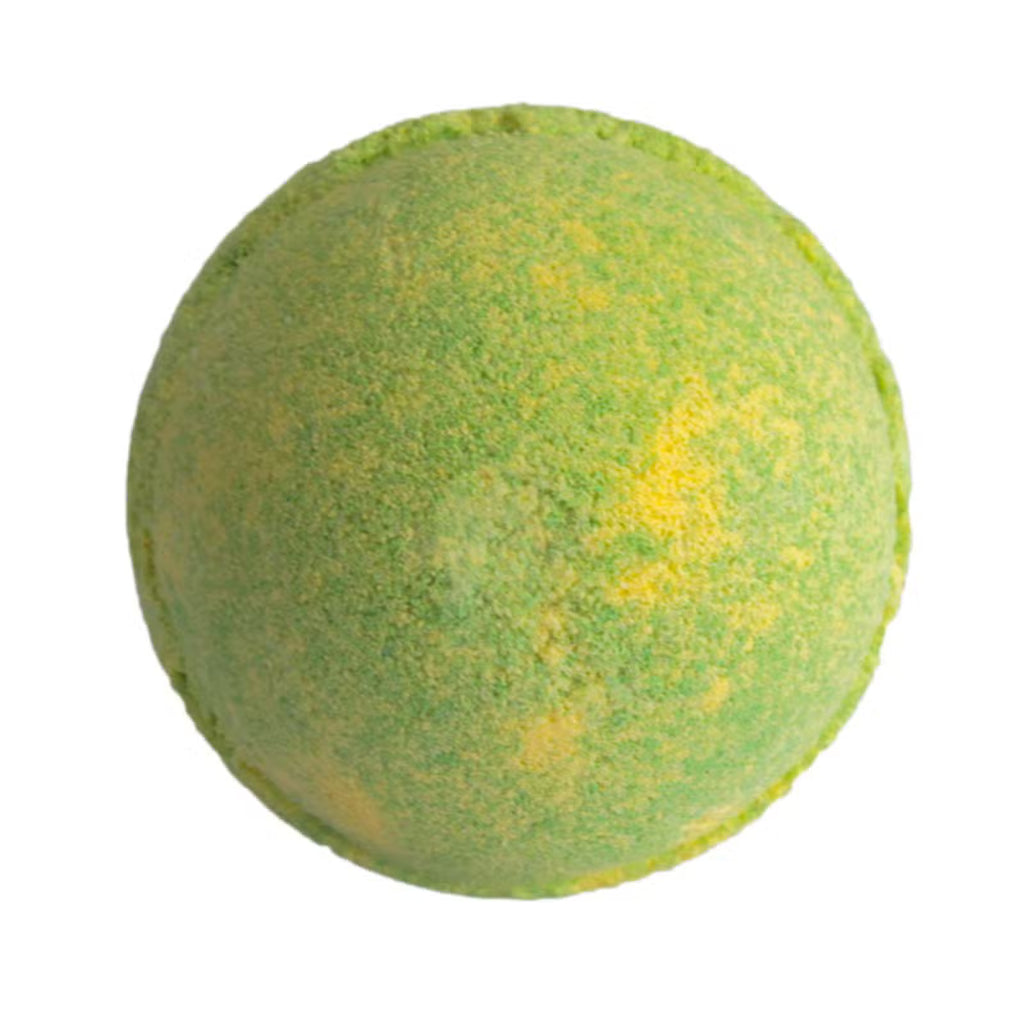 Green and yellow Pear Piña Colada bath bomb on white background