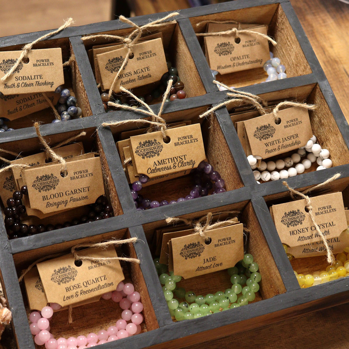 Bracelets displayed on a wooden jewellery stand